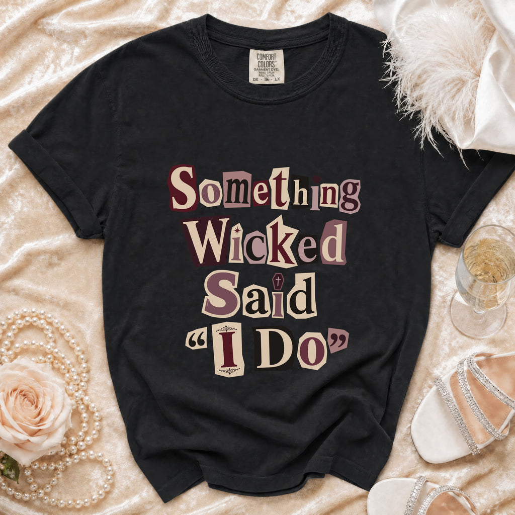 Black Comfort Colors t-shirt with "Something Wicked Said 'I Do'" text graphic.