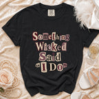 Black Comfort Colors t-shirt with "Something Wicked Said 'I Do'" text graphic.