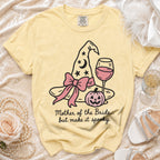 Yellow t-shirt with "Mother of the Bride... but make it spooky" text and Halloween graphics.