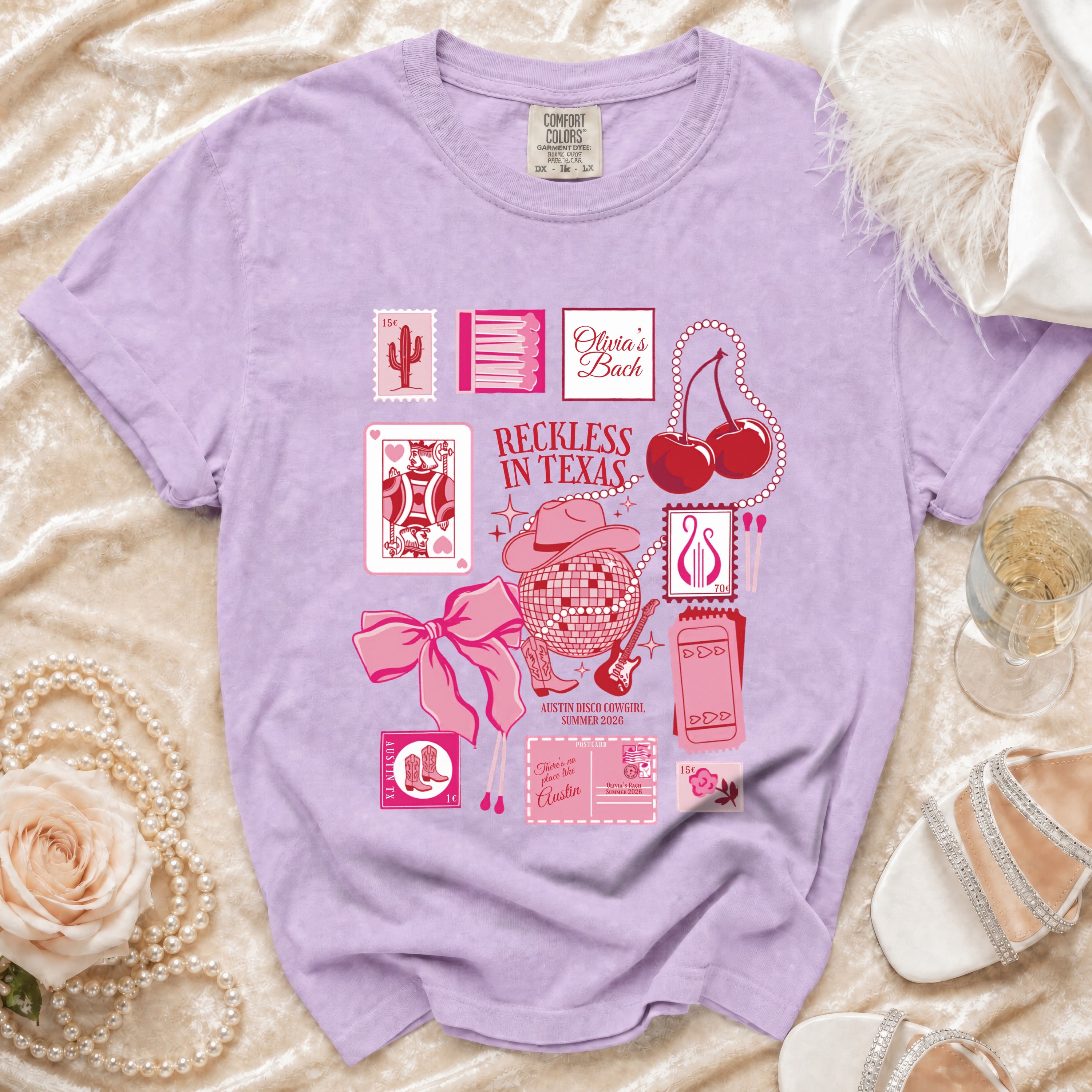 Purple Comfort Colors t-shirt with "Olivia's Bach Reckless in Texas" graphic.