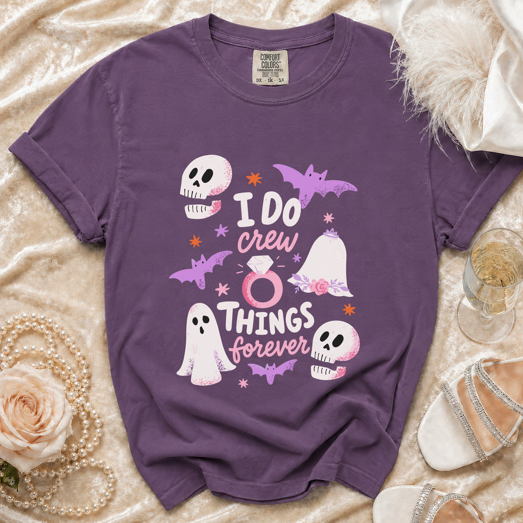 Purple t-shirt with "I DO crew THINGS forever" text and Halloween-themed graphics.