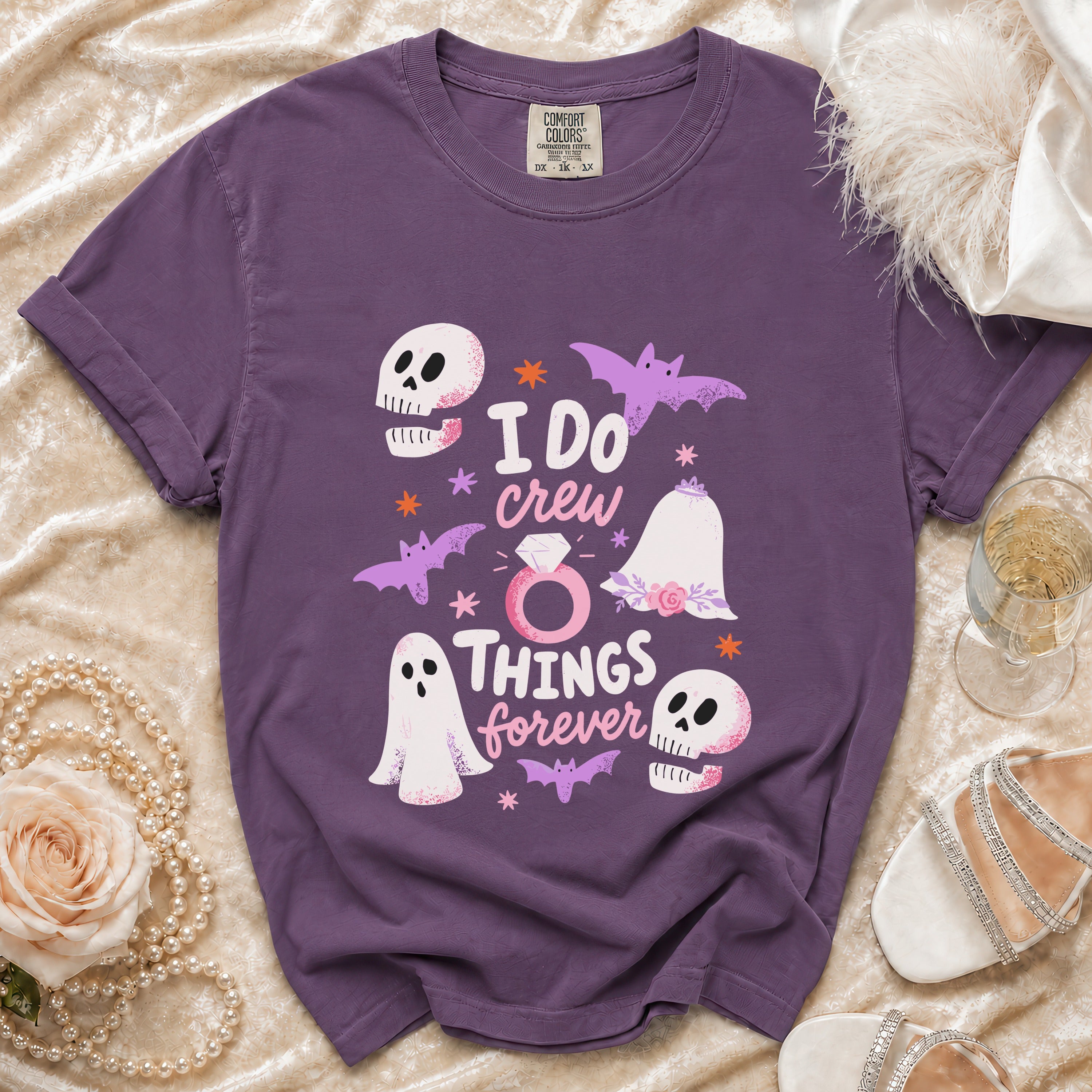 Purple t-shirt with "I DO crew THINGS forever" text and Halloween-themed graphics.