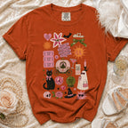 Orange t-shirt with "Mother of the Bride" graphics including a cat, pumpkin carriage, and phrases.