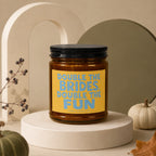 Brown glass candle with yellow label reading "Double the Brides, Double the Fun".