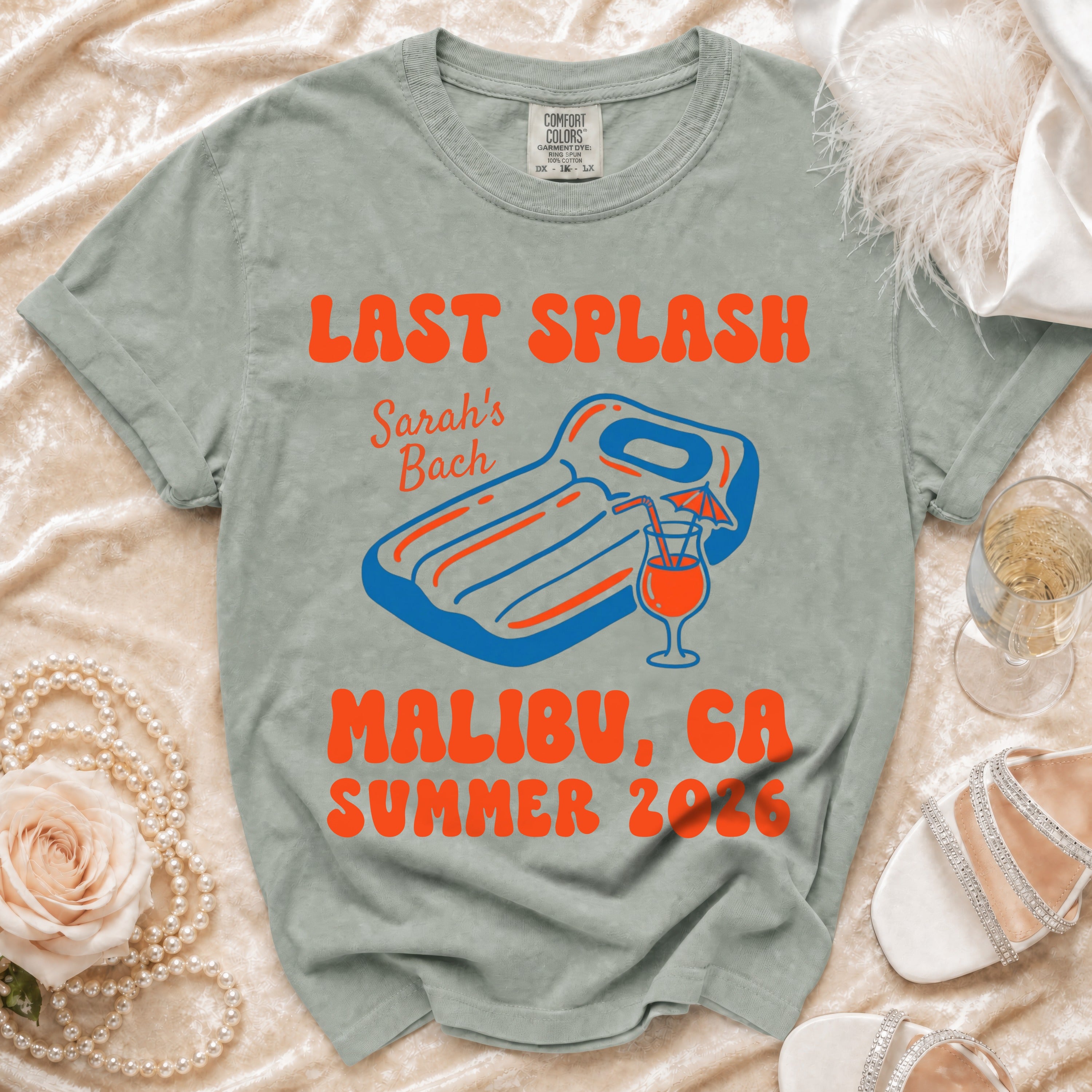 Last Splash Bach Malibu GA Summer 2026 t-shirt with inflatable mattress and drink.