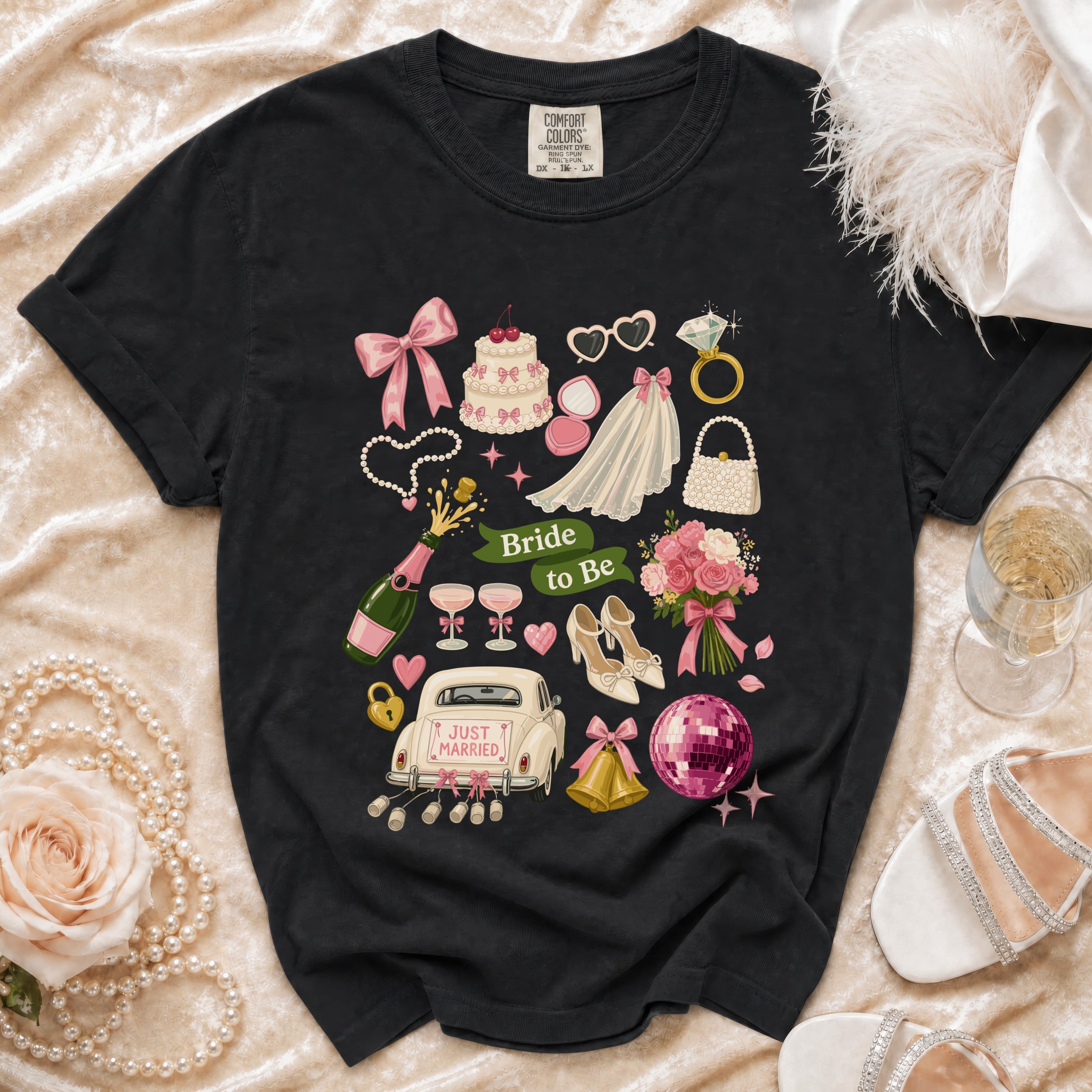 Black t-shirt with "Bride to Be" graphic and wedding icons.