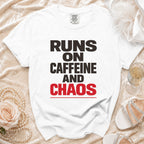 White t-shirt with "RUNS ON CAFFEINE AND CHAOS" text.