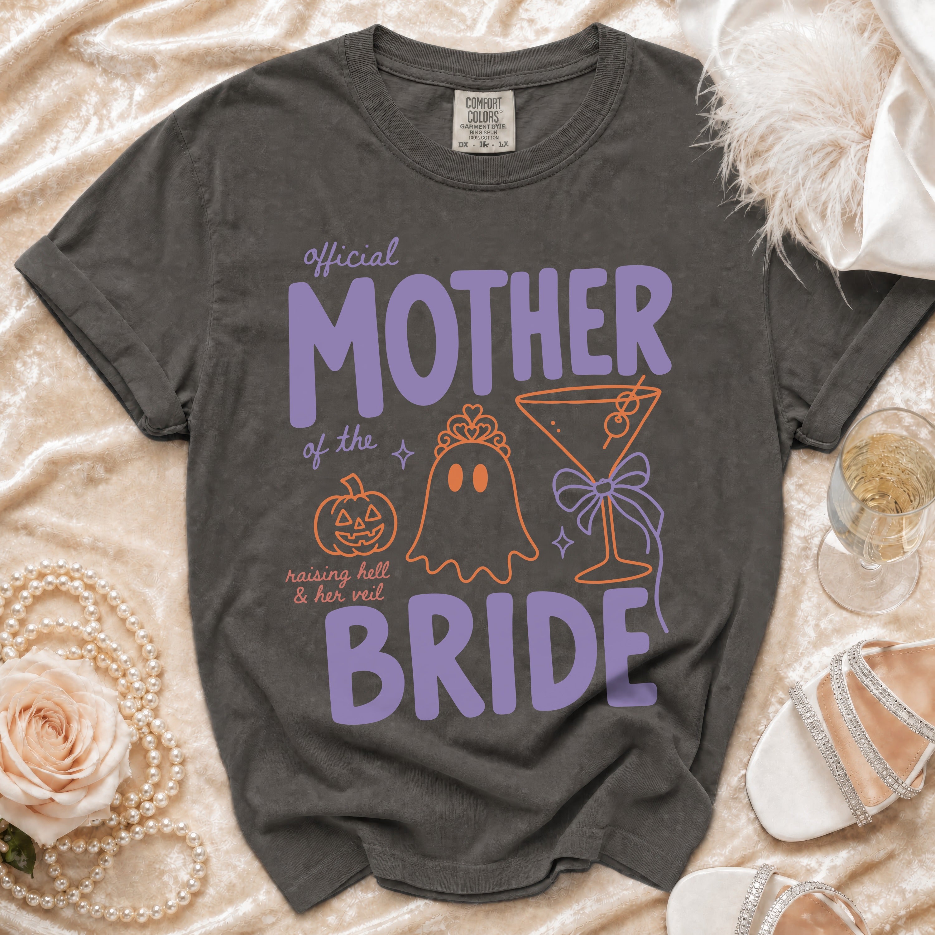 Dark gray t-shirt with "Official Mother of the Bride" text and graphics.