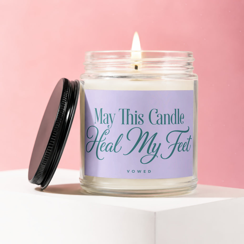 Candle with purple label reading "May This Candle Heal My Feet Vowed."