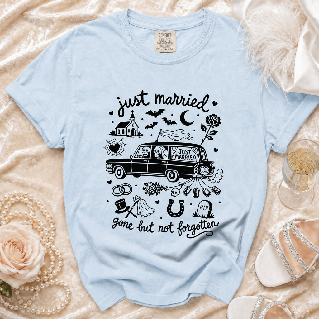 Light blue t-shirt with "just married" and spooky wedding graphics, text reads "gone but not forgotten".