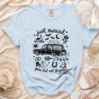 Light blue t-shirt with "just married" and spooky wedding graphics, text reads "gone but not forgotten".