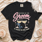 Black t-shirt with "Mother of the Groom" and champagne glasses graphic.
