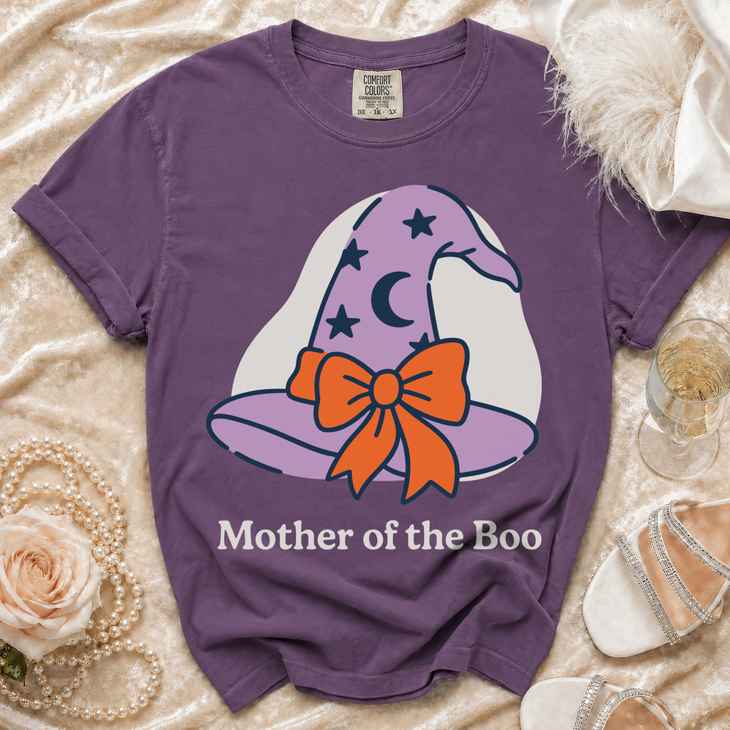Purple t-shirt with "Mother of the Boo" text and a witch hat graphic.