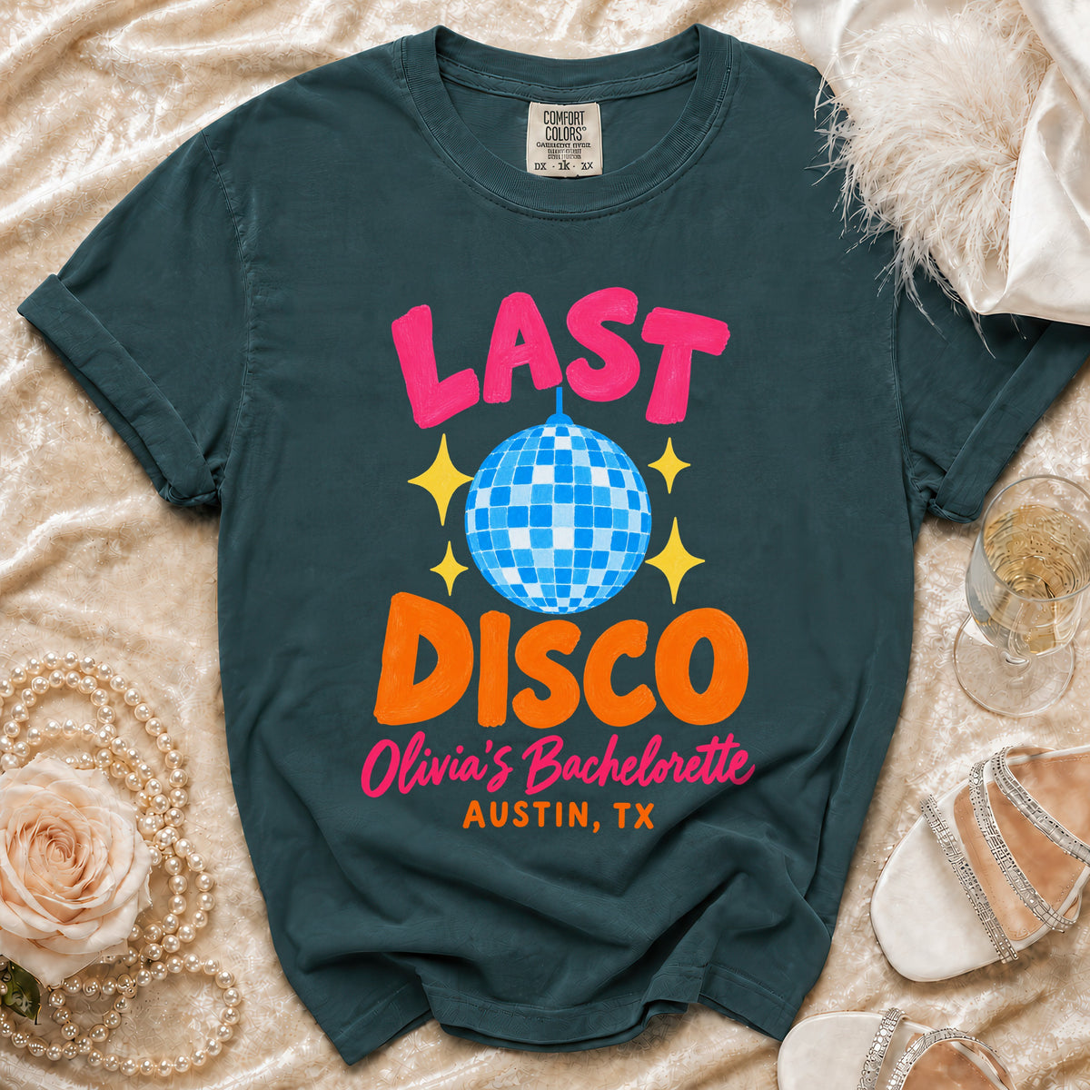 T-shirt with "Last Disco Olivia's Bachelorette Austin, TX" text and disco ball graphic.