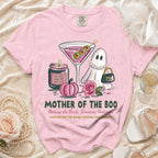 Pink t-shirt with "Mother of the Boo" graphic featuring a ghost, martini, pumpkin, and candle.