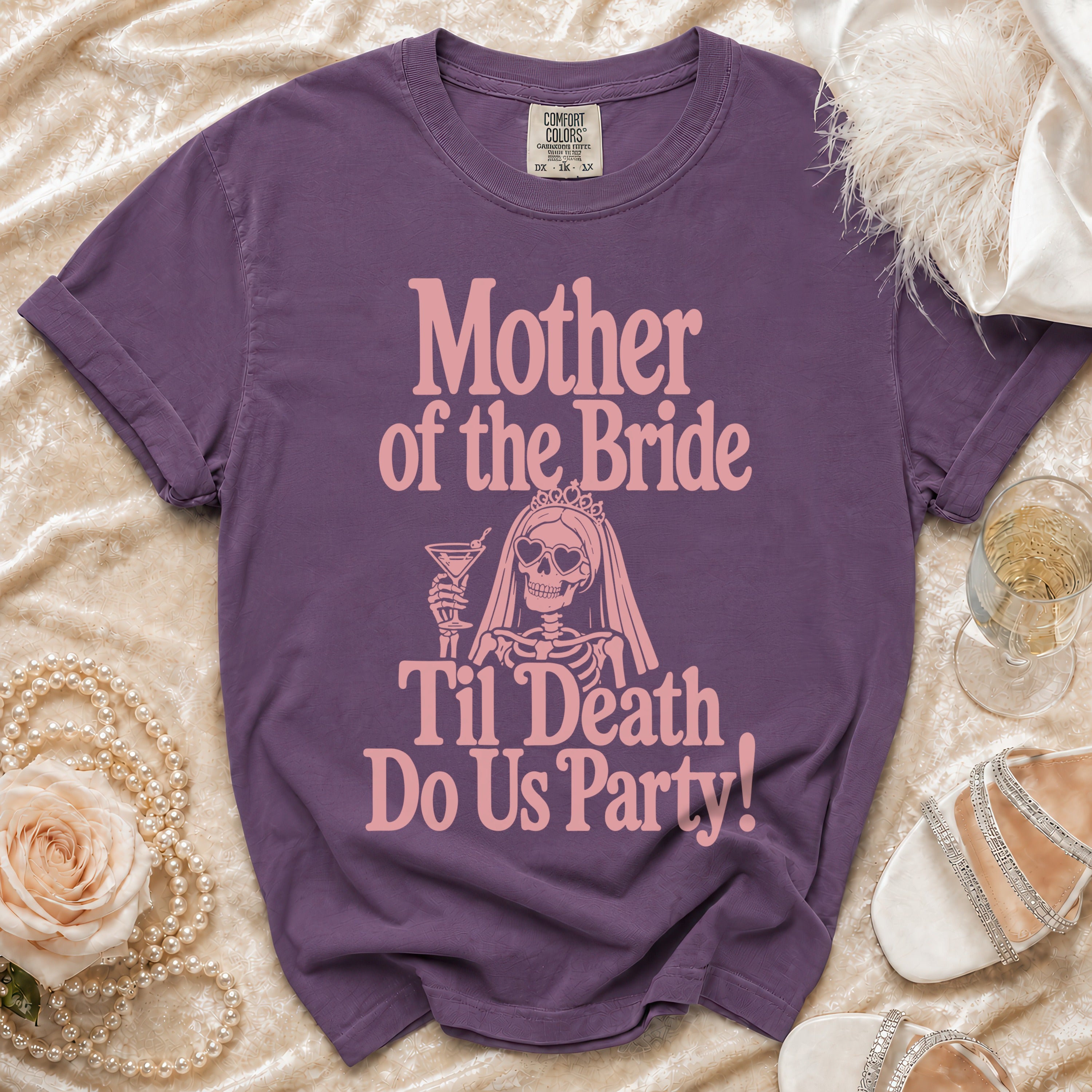 Purple t-shirt with "Mother of the Bride 'Til Death Do Us Party!" text and skeleton graphic.