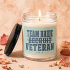 Candle with text "Team Bride Recruit Veteran Vowed".