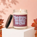 Glass candle with "Two grooms, no notes, no chill" text on label.