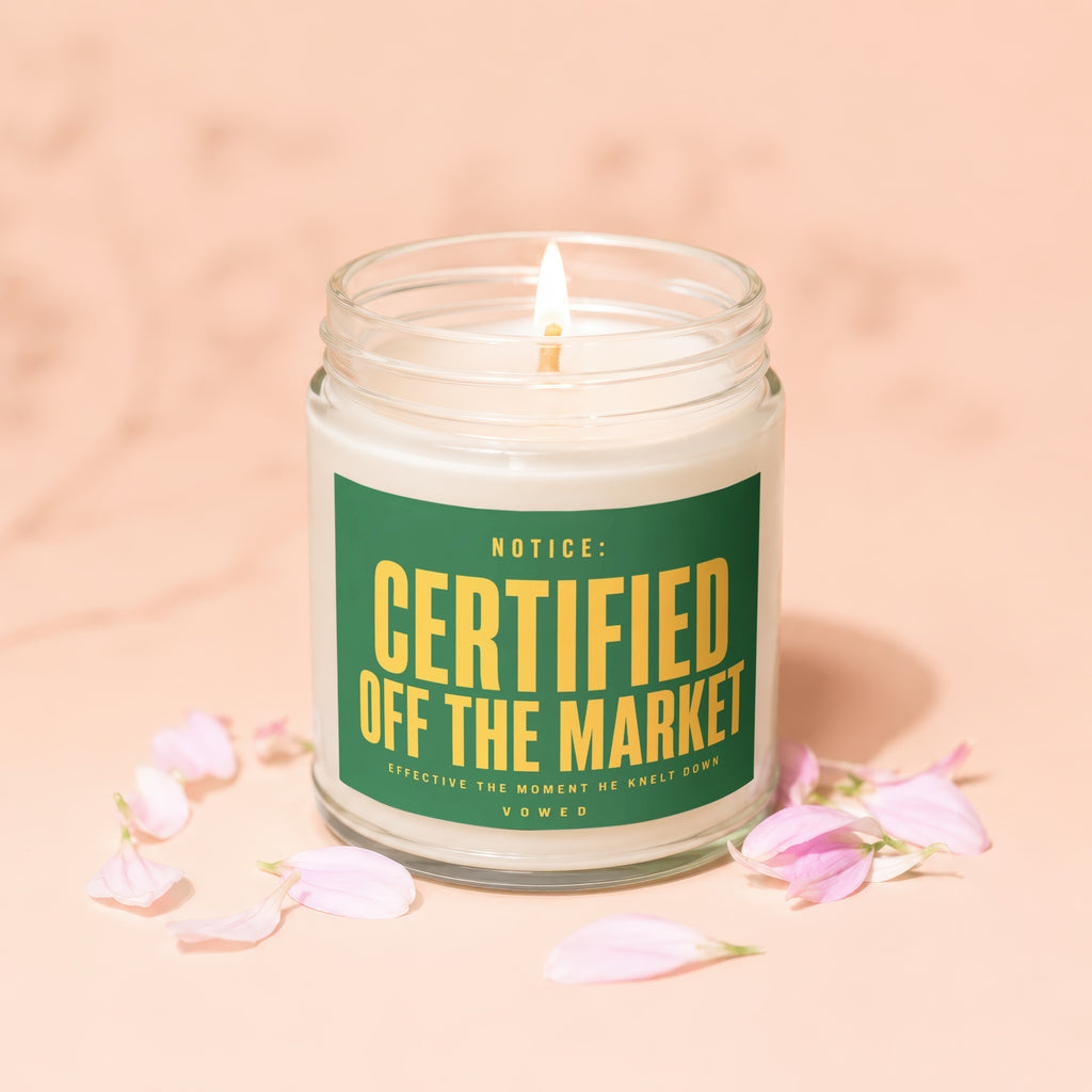 Candle with "Certified Off the Market" inscribed on green label.