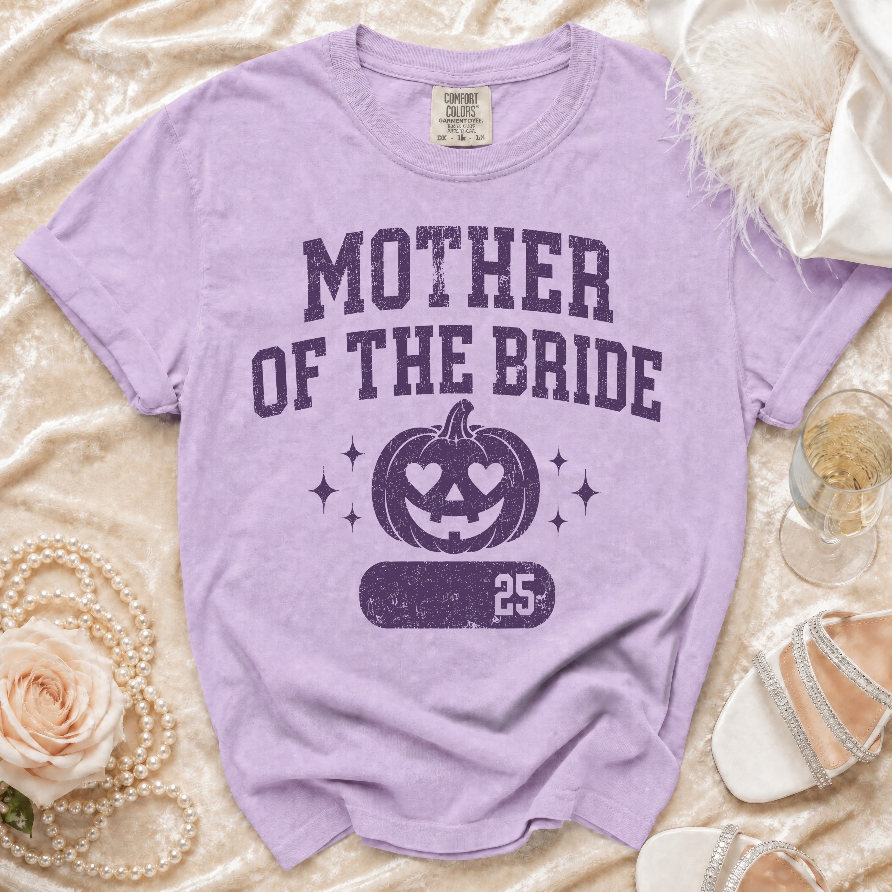 Purple t-shirt with "MOTHER OF THE BRIDE" and a pumpkin graphic.