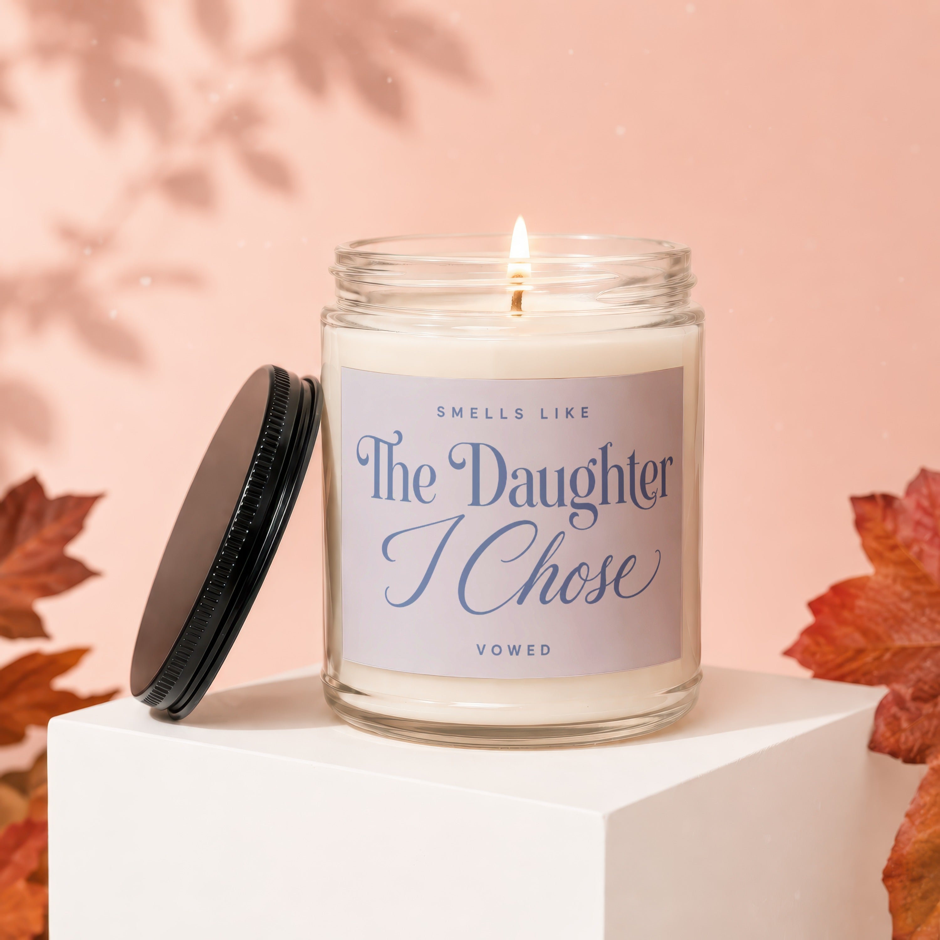 Candle that reads "Smells Like The Daughter I Chose".