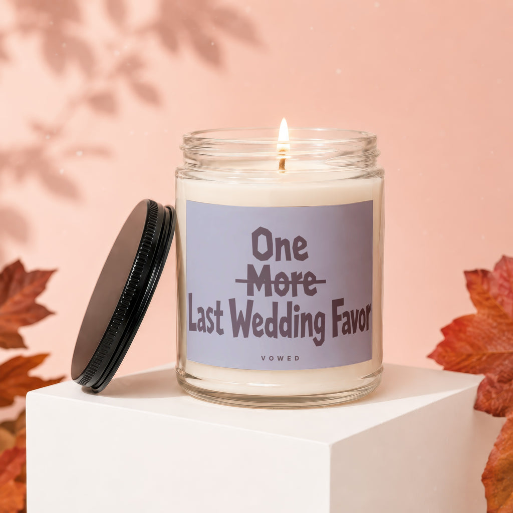 Glass candle with light and label reading "One Last Wedding Favor".
