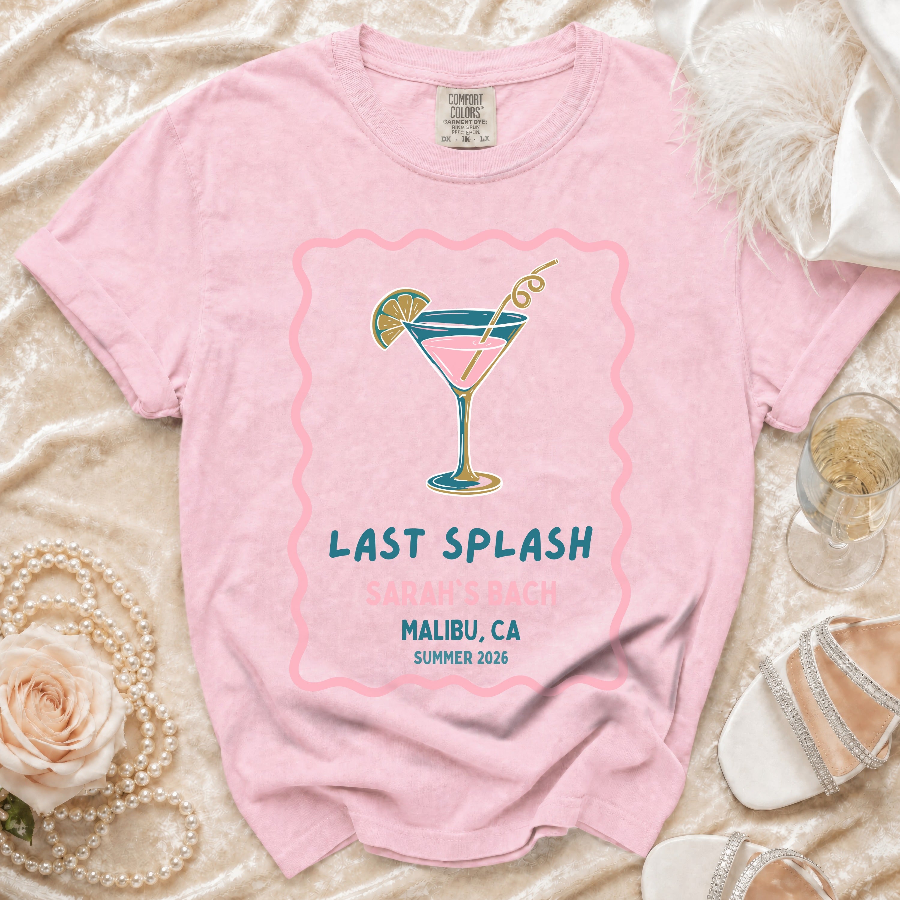 Pink t-shirt with "Last Splash Sarah's Bach Malibu, CA Summer 2026" text.