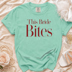 Mint green t-shirt with "This Bride Bites" text in dark red.
