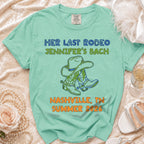 "Her Last Rodeo Jennifer's Bach" t-shirt with cowboy boots and hat.