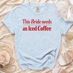Light blue t-shirt with red text "This Bride needs an Iced Coffee".