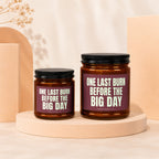 Two amber glass candles with black lids, labeled "One Last Burn Before the Big Day".