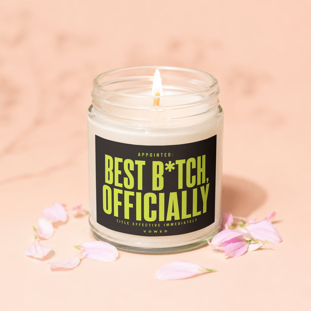 Jar candle with a black label that reads "APPOINTED: BEST B*TCH, OFFICIALLY".