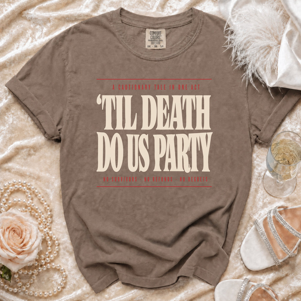 Brown t-shirt with "Til Death Do Us Party" text, featuring "A Cautionary Tale in One Act" and "No Survivors, No Refunds, No Regrets."