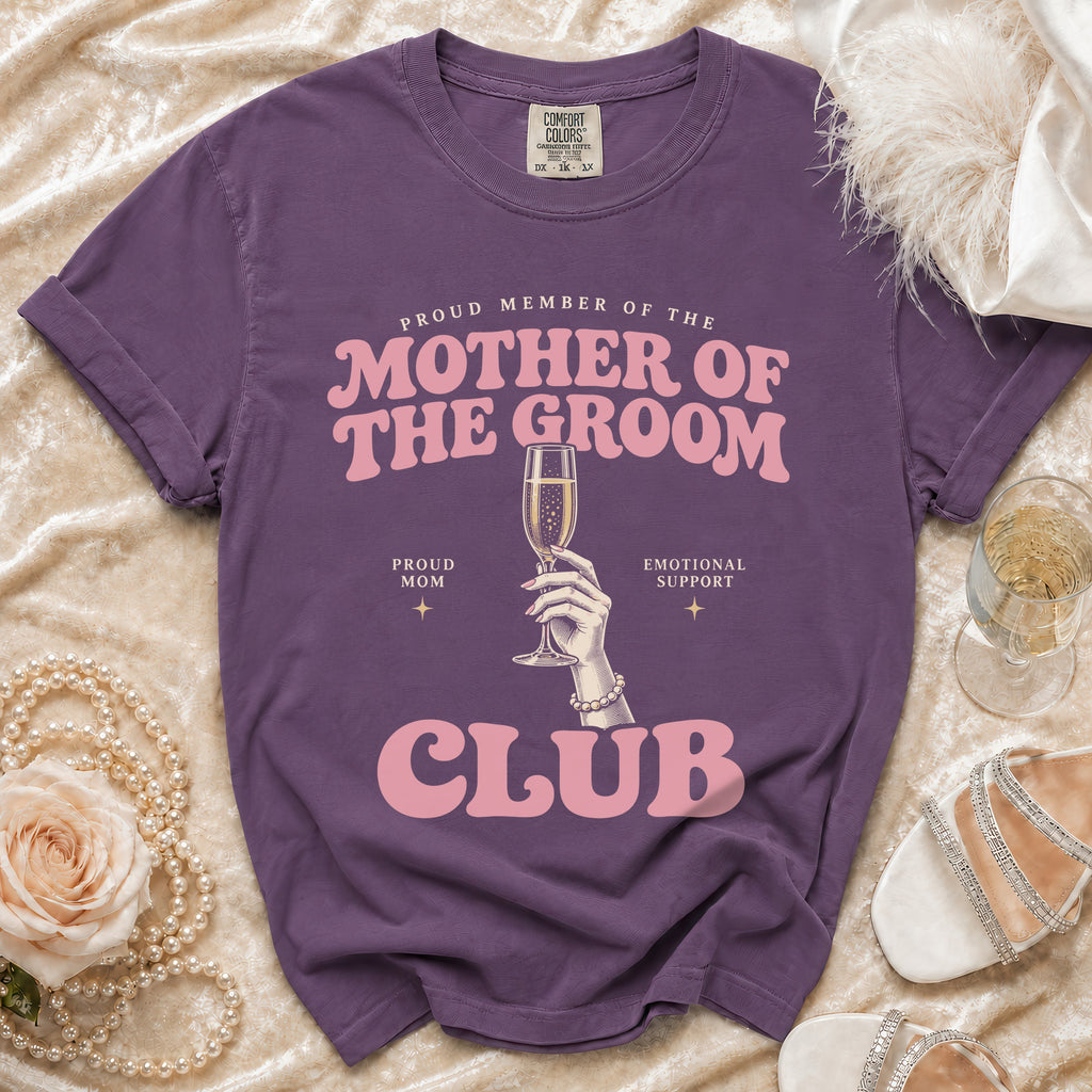 Purple t-shirt with "Proud Member of the Mother of the Groom Club" text and champagne flute.
