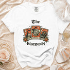 White t-shirt with "The Honeymoon" tarot card graphic including past, present, and future.