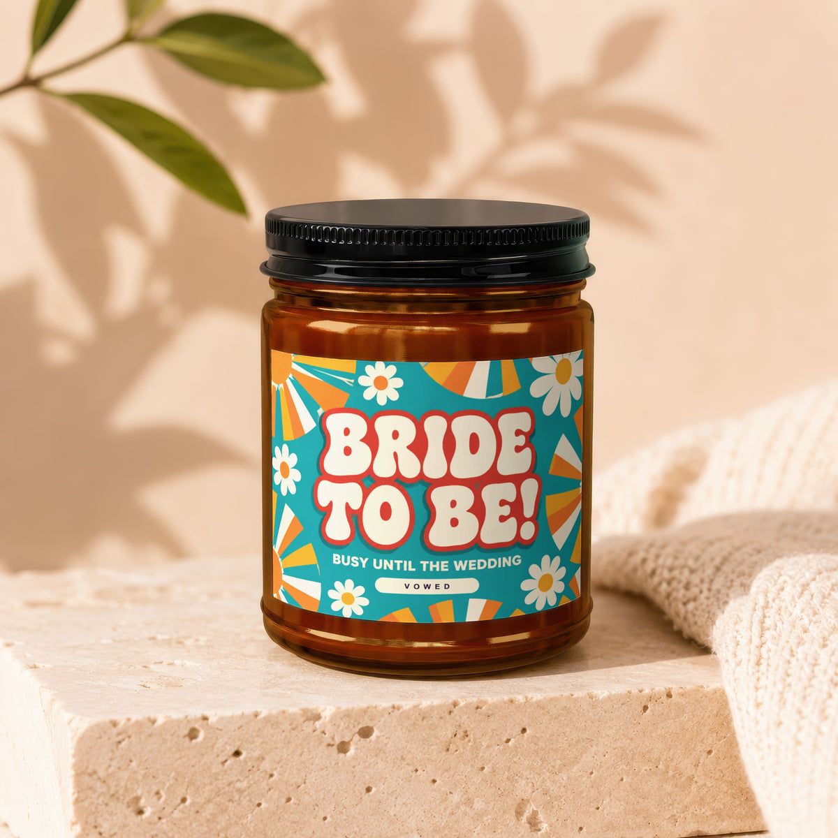 Brown glass candle jar with "Bride to Be! Busy Until The Wedding Vowed" label.