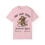 Pink t-shirt with "Her Last Rodeo" and cowboy boots graphic.