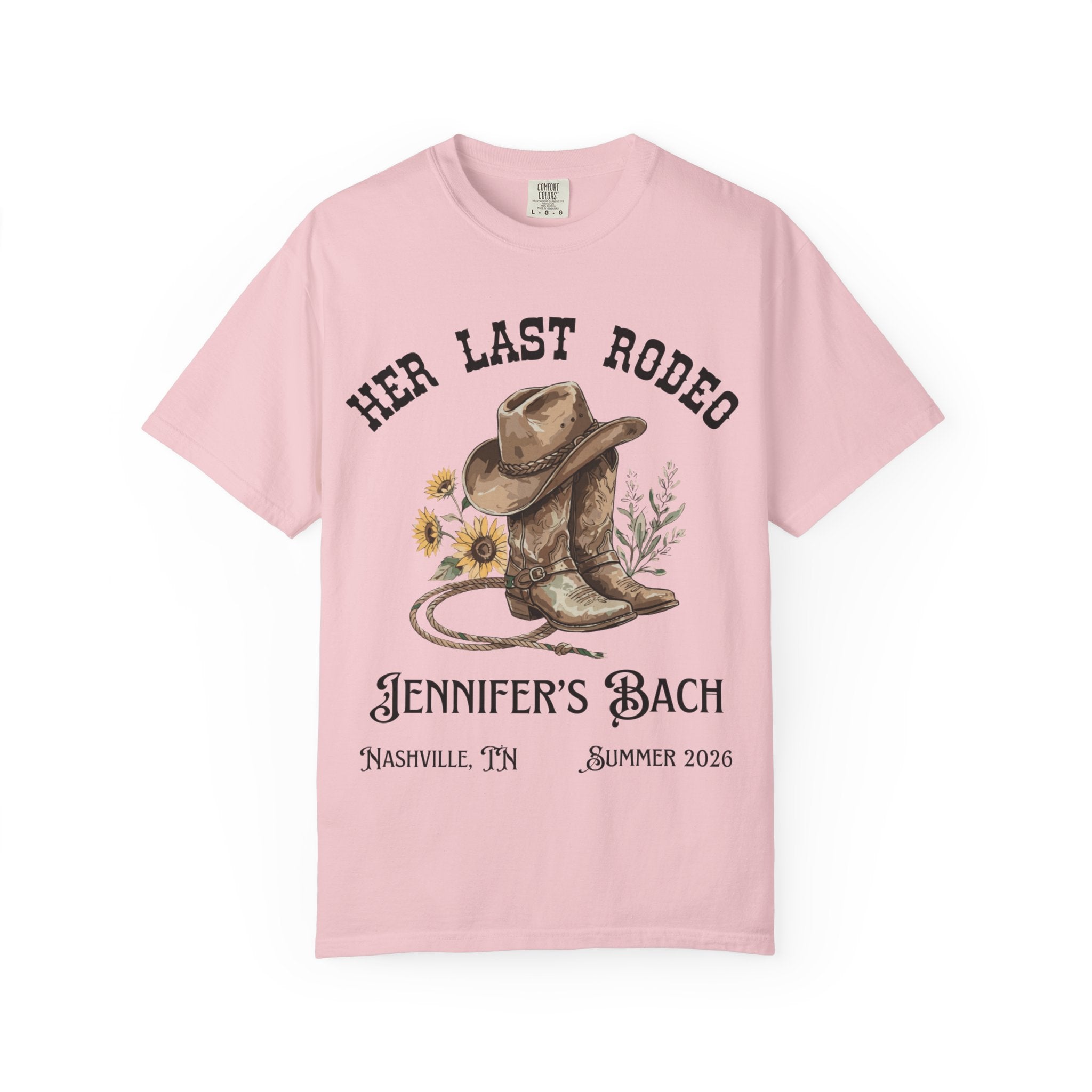Pink t-shirt with "Her Last Rodeo" and cowboy boots graphic.