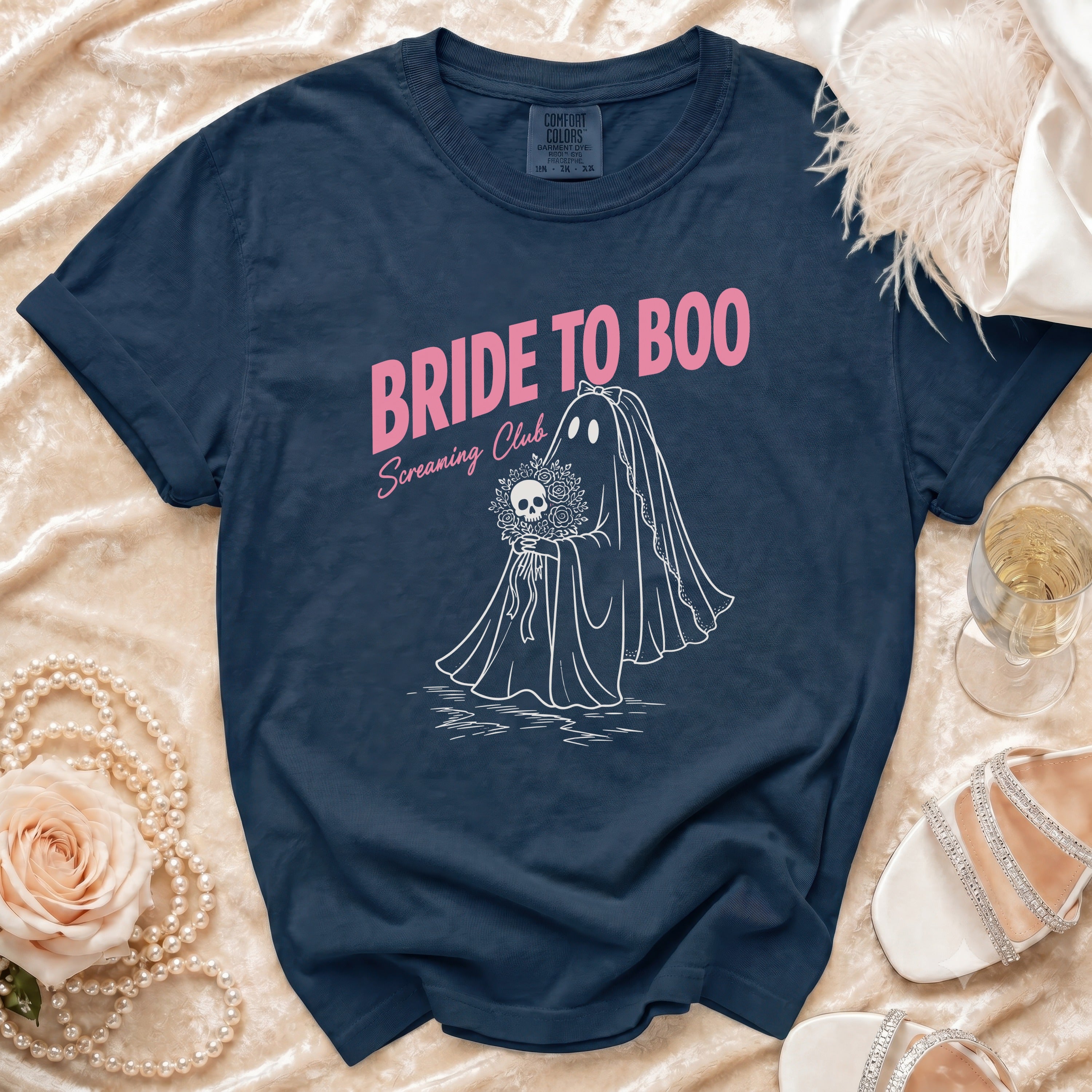 Navy t-shirt with "BRIDE TO BOO Screaming Club" text and a ghost bride illustration.
