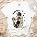 White t-shirt with "This Bride Bites" text and a skeleton bride graphic.