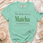 Mint green t-shirt with text "This Bride runs on Matcha and unbothered energy".