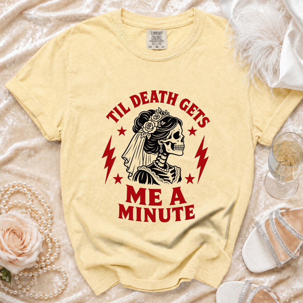 Yellow t-shirt with skeleton bride graphic and text "Til Death Gets Me A Minute".