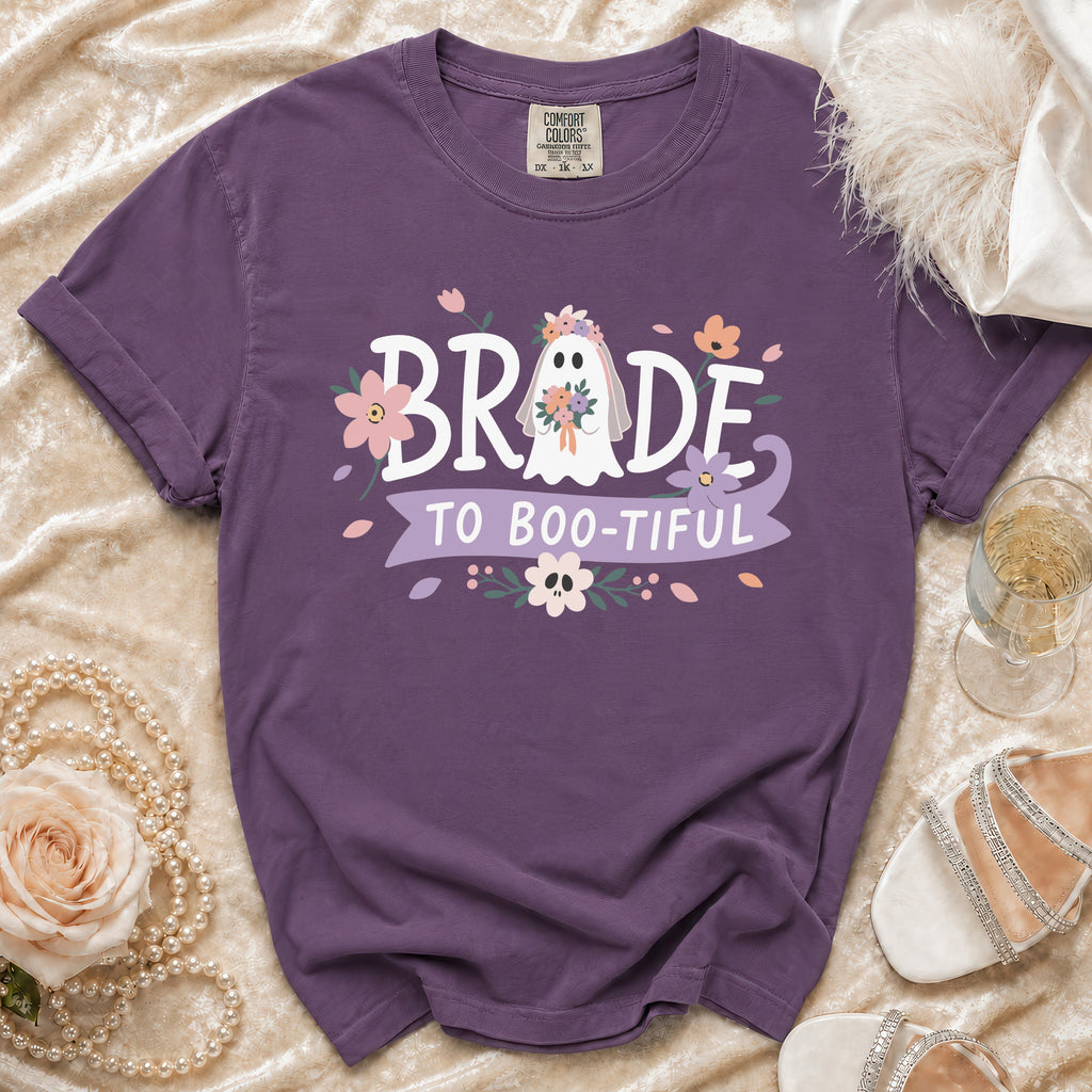 Purple t-shirt with "Bride to Boo-tiful" text and a ghost bride graphic.