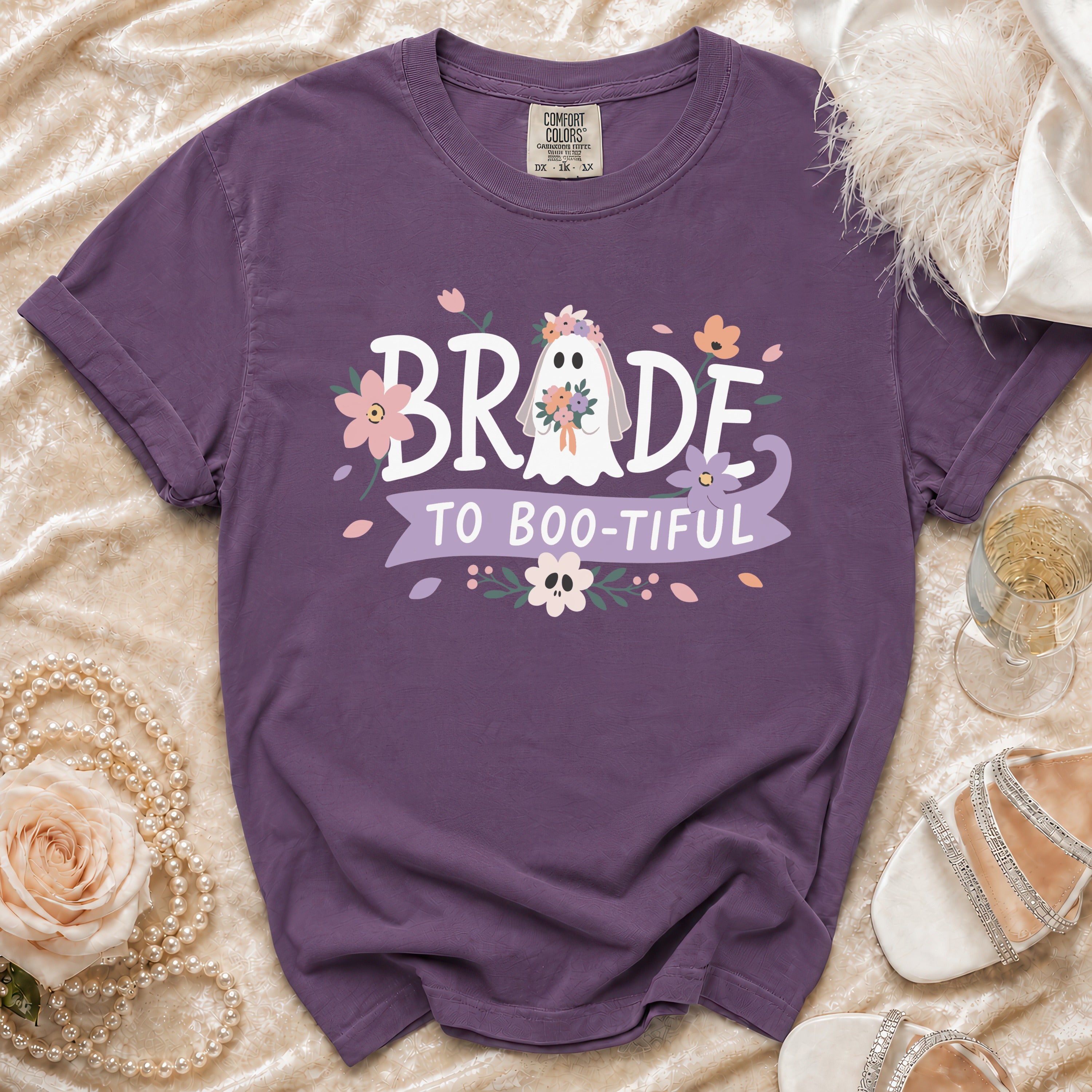 Purple t-shirt with "Bride to Boo-tiful" text and a ghost bride graphic.