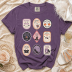 Purple t-shirt with nine Halloween-themed oval patches for brides and their mothers.