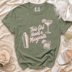 Olive green t-shirt with pink text and margarita graphics.