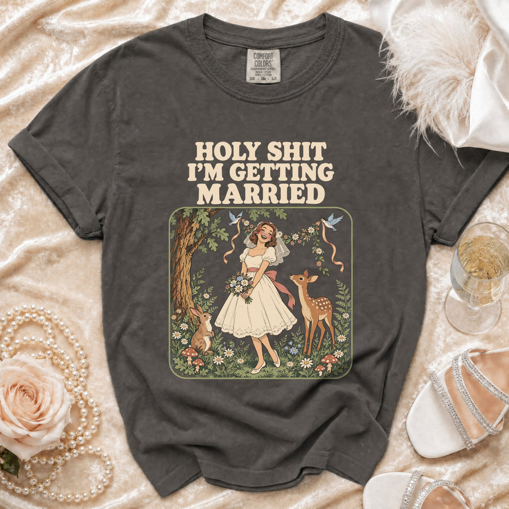 Dark grey t-shirt with "HOLY SHIT I'M GETTING MARRIED" text and wedding graphic.