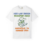 White t-shirt with "Her Last Rodeo Jennifer's Bach Nashville, TN Summer 2026" and cowboy boots.