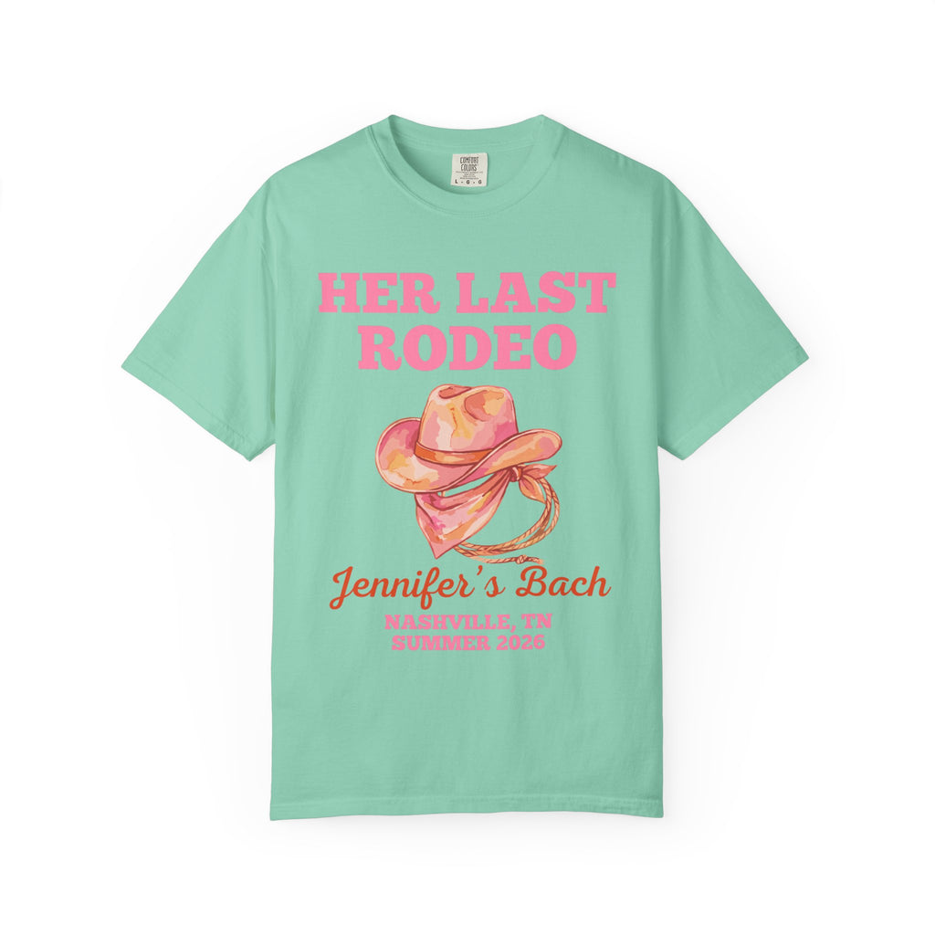 Mint t-shirt with pink "Her Last Rodeo" text, cowboy hat, and bachelorette details.