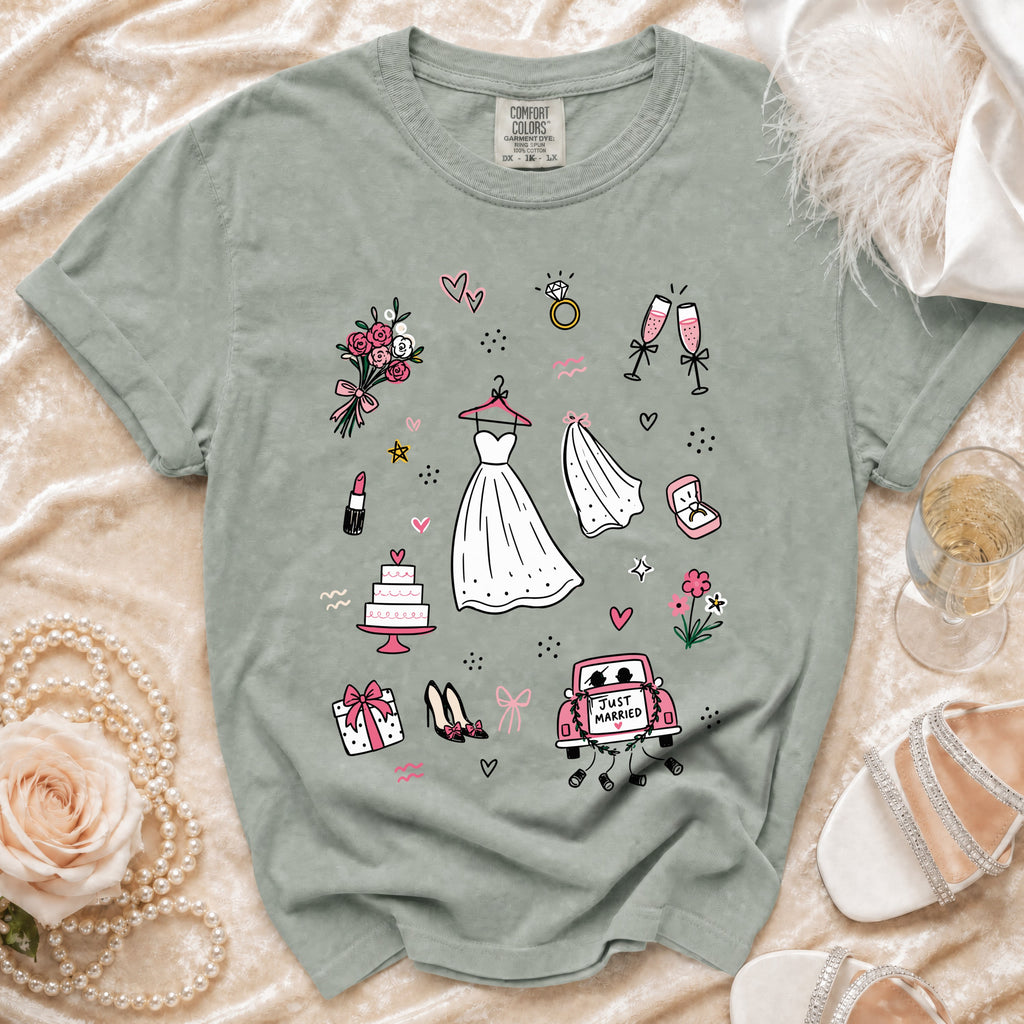 T-shirt with wedding-themed icons including a dress, veil, cake, and "Just Married" car.